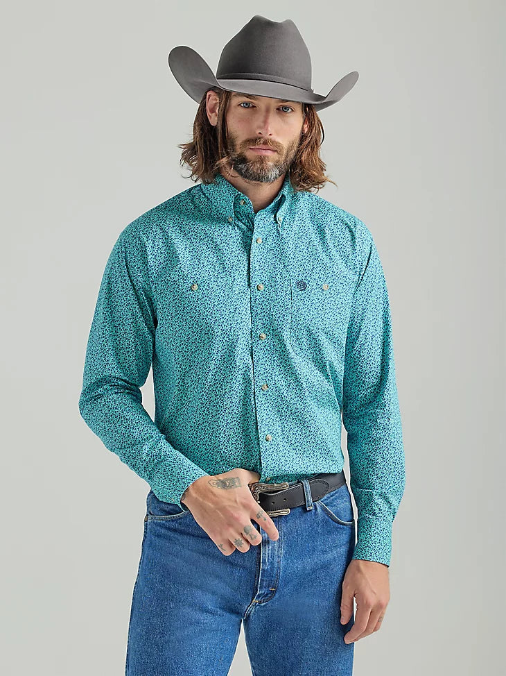 WRANGLER GEORGE STRAIT LONG SLEEVE TWO POCKET BUTTON DOWN PRINT SHIRT IN TEAL FLOWERS